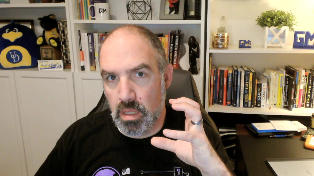 Seth hold up his hand in frustration looking angry